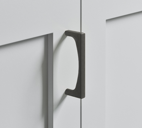 The Top Knobs Riverside pull in an Ash Gray finish.